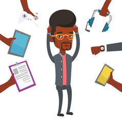 Young man surrounded with his gadgets.