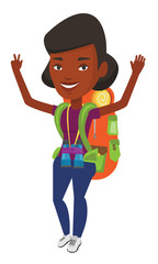 Backpacker with hands up celebrating success.