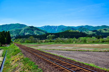 線路のある長閑な風景（秋田県仙北市）