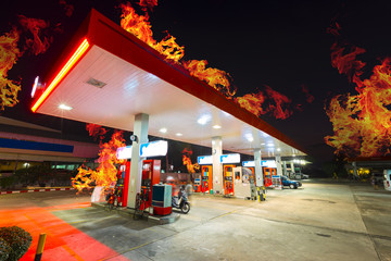 Gas station burned out at night time.