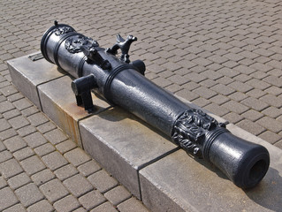 Ancient gun barrel in the free open air museum of ancient cannons in Novorossiysk, Russia