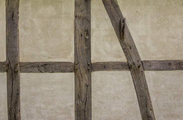 Old adobe wall of the half timbered house