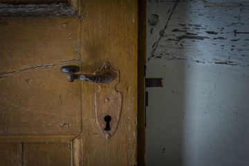 The old vintage door handle and keyhole