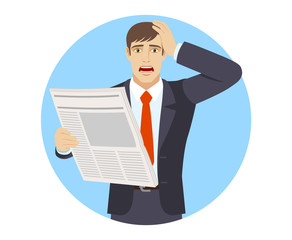 Businessman with newspapergrabbed his head