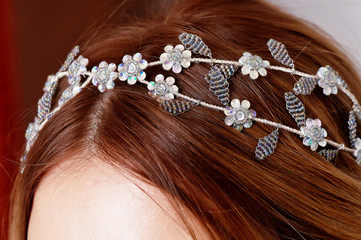 Decoration of silver beading on the girl's hair.