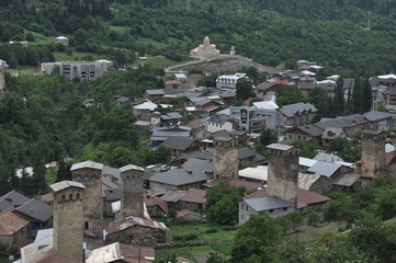 Fototapeta na wymiar Georgia. Swan tower. Residential building defensive in mountains. Caucasus.