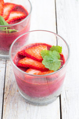 fruit pudding in glasses close-up.
