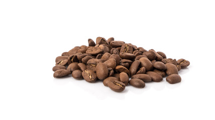 Roasted coffee beans on white background