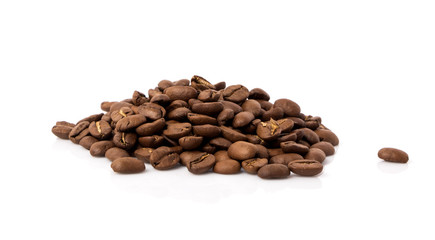 Roasted coffee beans on white background