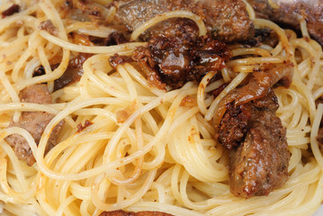 Liver or meat and spagetti  -fine food background