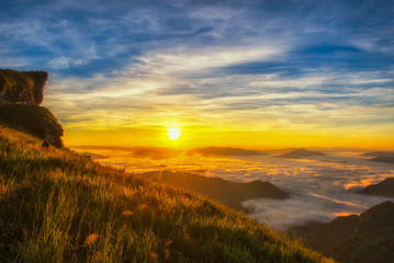 Naklejka premium Morning light on the top of Phu Chi Fa in Chiang Rai.