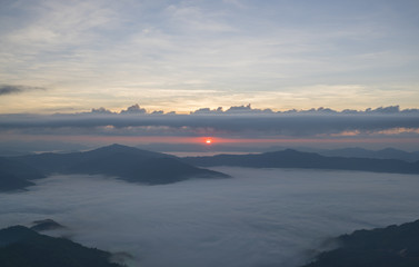 Sunrise with fog at the mountain in morning.