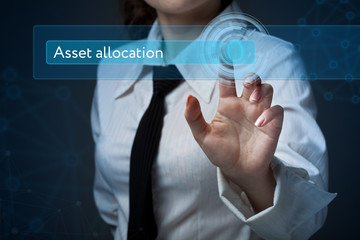 Business, technology, internet and networking concept. Business woman presses a button on the virtual screen: Asset allocation