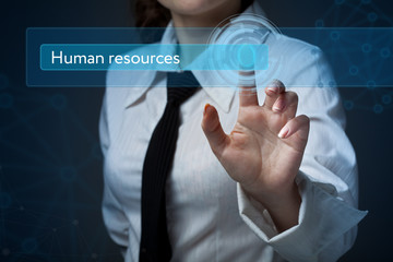 Business, technology, internet and networking concept. Business woman presses a button on the virtual screen: Human resources