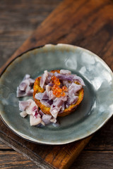 Potato pancake with glazed red onion