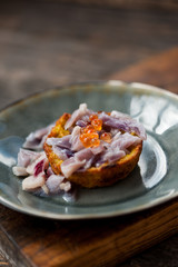 Potato pancake with glazed red onion