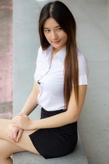 Portrait of thai adult student university uniform beautiful girl relax and smile