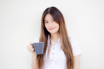 Portrait of thai adult student university uniform beautiful drinking coffee