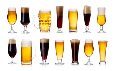 set of frosty glass of light beer with foam on white 