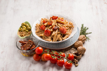 pasta with dried tomatoes green olives and sicilian pesto