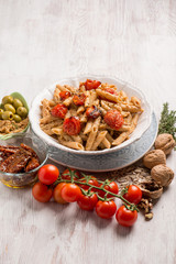 pasta with dried tomatoes green olives and sicilian pesto