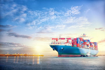International Container Cargo ship in the ocean at sunset sky, Freight Transportation, Nautical...