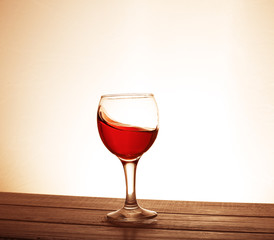 ed wine in the glass on the table. The concept of beverages and alcohol.