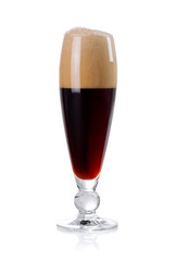 elegant glass of dark beer with foam isolated.