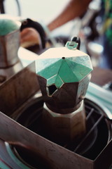 moka pot Italian traditional coffee maker with hot coffee