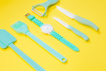 Cooking tools and kitchen utensil on color background