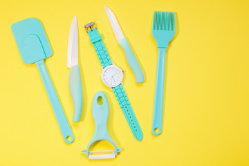 Cooking tools and kitchen utensil on color background
