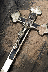 Cross and ash - symbols of Ash Wednesday.