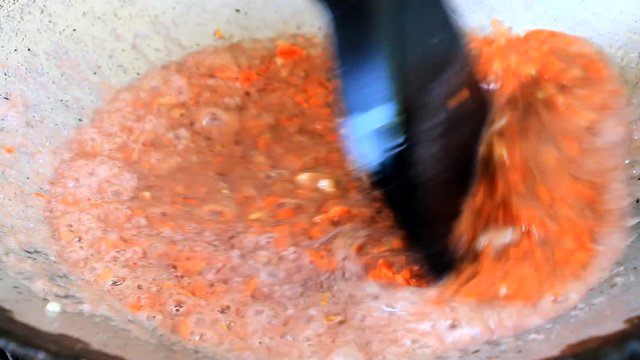 frying shrimp paste or kapi with onion