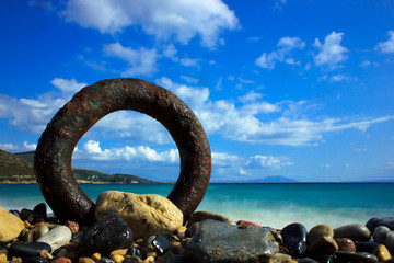 Fototapeta premium choppy seas and iron pier under blue skies