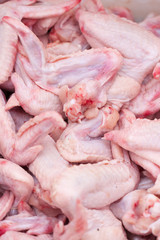 raw chicken wings sold in the market. Selective focus