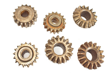 Old metal cogs isolated on white