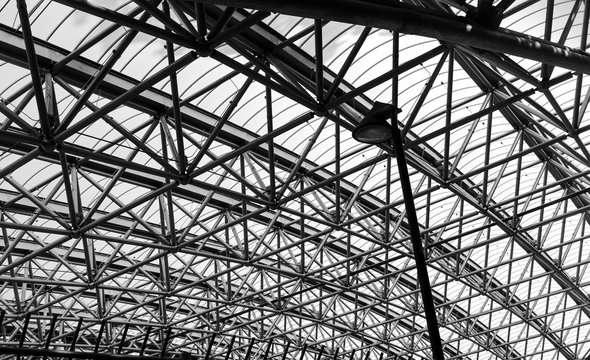 Abstract architecture part of steel structure roof. Black and white photography
