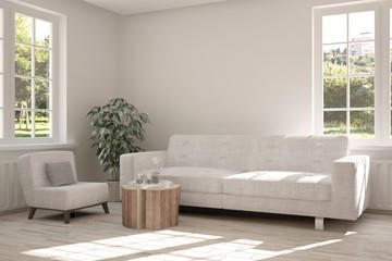 Fototapeta premium White room with sofa and green landscape in window. Scandinavian interior design