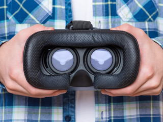 Hands with VR glasses