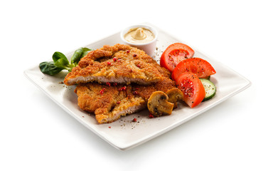 Fried pork chop and vegetables