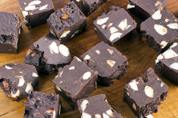Homemade nut fudge on wood board