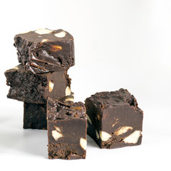 Homemade nut fudge on white background, isolated