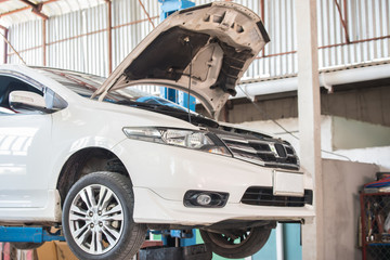 Fototapeta premium Car maintenance servicing mechanic 