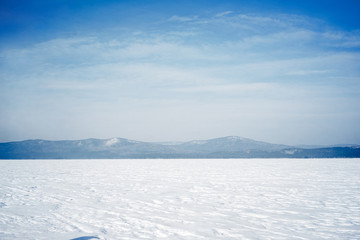 Fototapeta na wymiar landscape of a frozen mountain lake