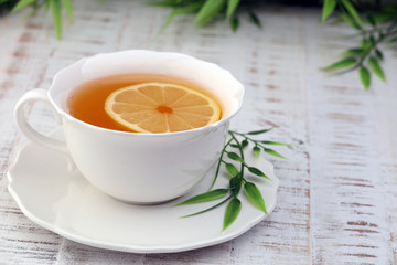 Tea. Herbal tea. Mint leaf. Tea in a glass cup, mint leaves, dried tea, sliced lime. herbs on a slate plate in a restaurant or teahouse
