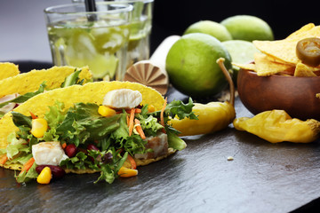 three mexican salat carnitas tacos