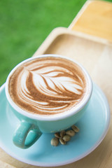 coffee cup and tasty cake in coffe shop, coffee heart cup