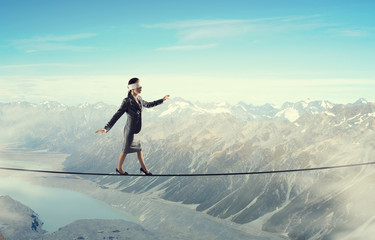 She is walking blindfolded    . Mixed media