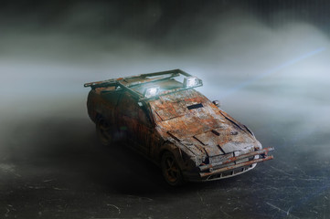 Post - apocalyptic handmade toy car on black background with smoke