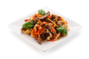 Rice noodles with meat, sauce and vegetables 